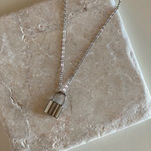 Silver lock pendant necklace